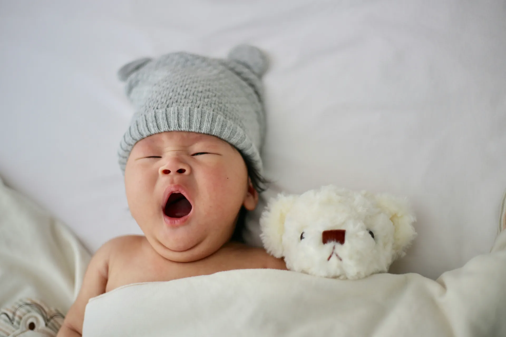 Caring pediatrician with child